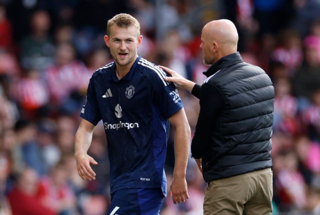 Manchester United's Matthijs de Ligt with manager Erik ten Hag after being substituted 