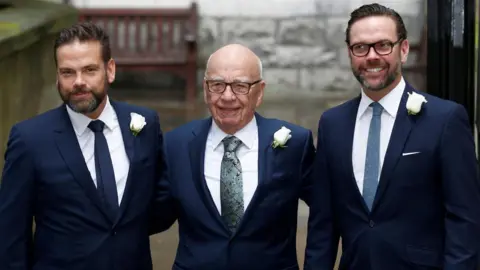 Reuters Rupert Murdoch poses for a photograph with his sons Lachlan (L) and James at his wedding to Jerry Hall in 2016