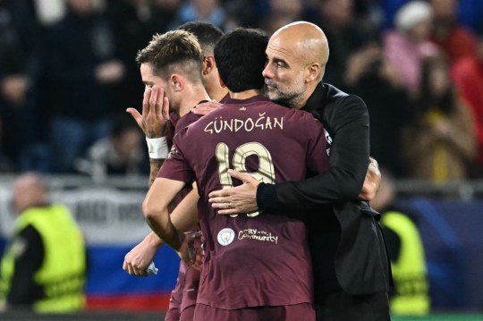 Manchester City's Spanish manager Pep Guardiola (R) celebrates with Manchester City's German midfielder #19 Ilkay Gundogan and team mates after the UEFA Champions League football match between SK Slovan Bratislava and Manchester City