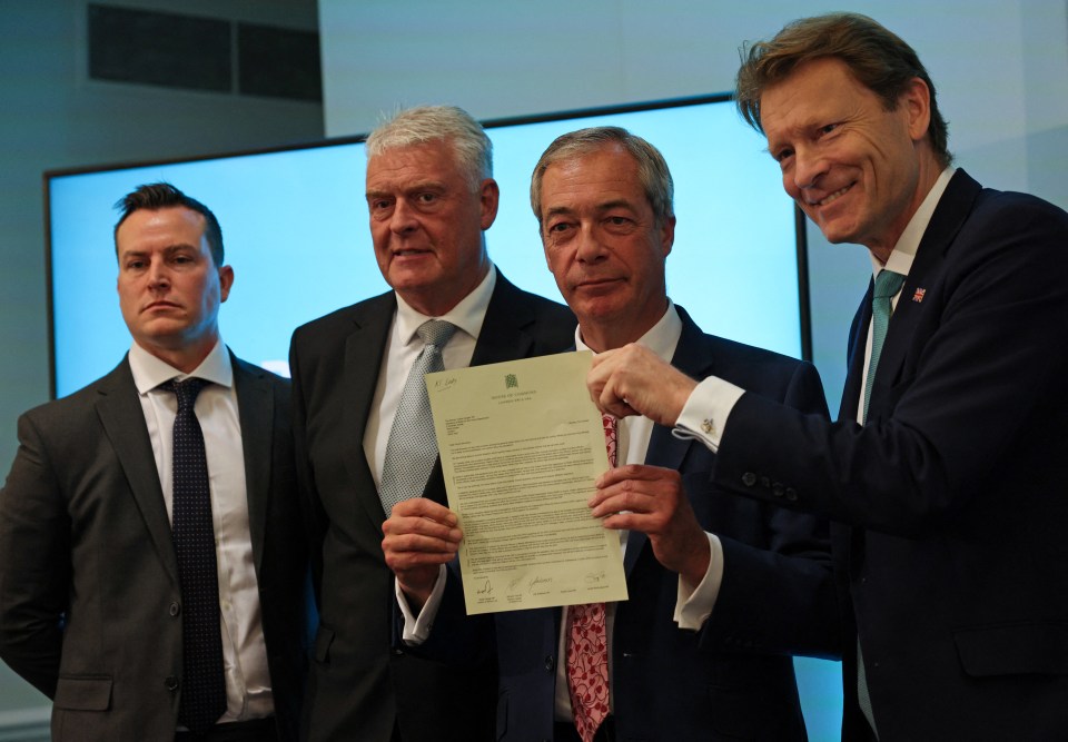 Nigel Farage and Reform MPs with their letter to Yvette Cooper