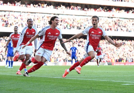 Leandro Trossard celebrates scoring the 3rd Arsenal goal with ((L) Gabriel and (2ndL) Riccardo Calafiori during the Premier League match between Arsenal FC and Leicester City FC