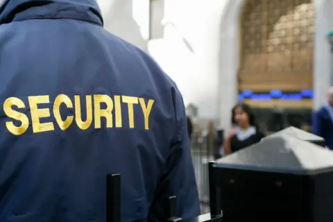 Getty Images The back of a security guard