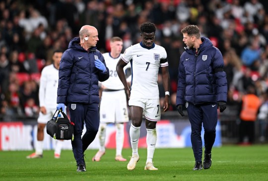 England player Bukayo Saka looks dejected as he leaves the pitch with an injury during the Nations League match between England and Greece at Wembley Stadium