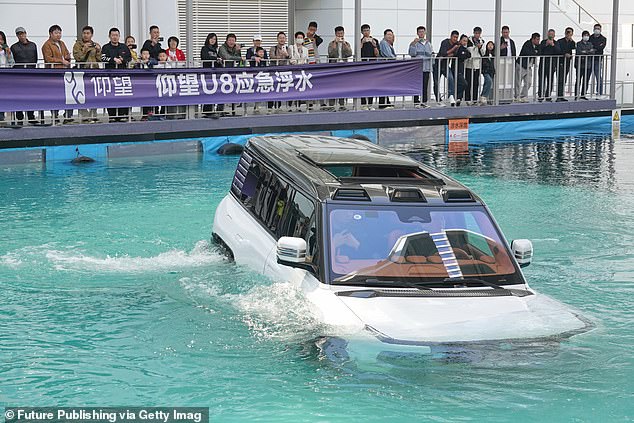 The U8, pictured during a demonstration in China, can stay afloat for half an hour and move at 3km/h in the water. The U8's viral 'tank turn' maneuver can even be performed while floating