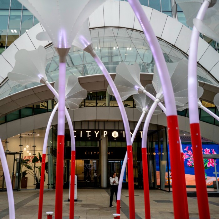 View through a modern sculpture of Citypoint building