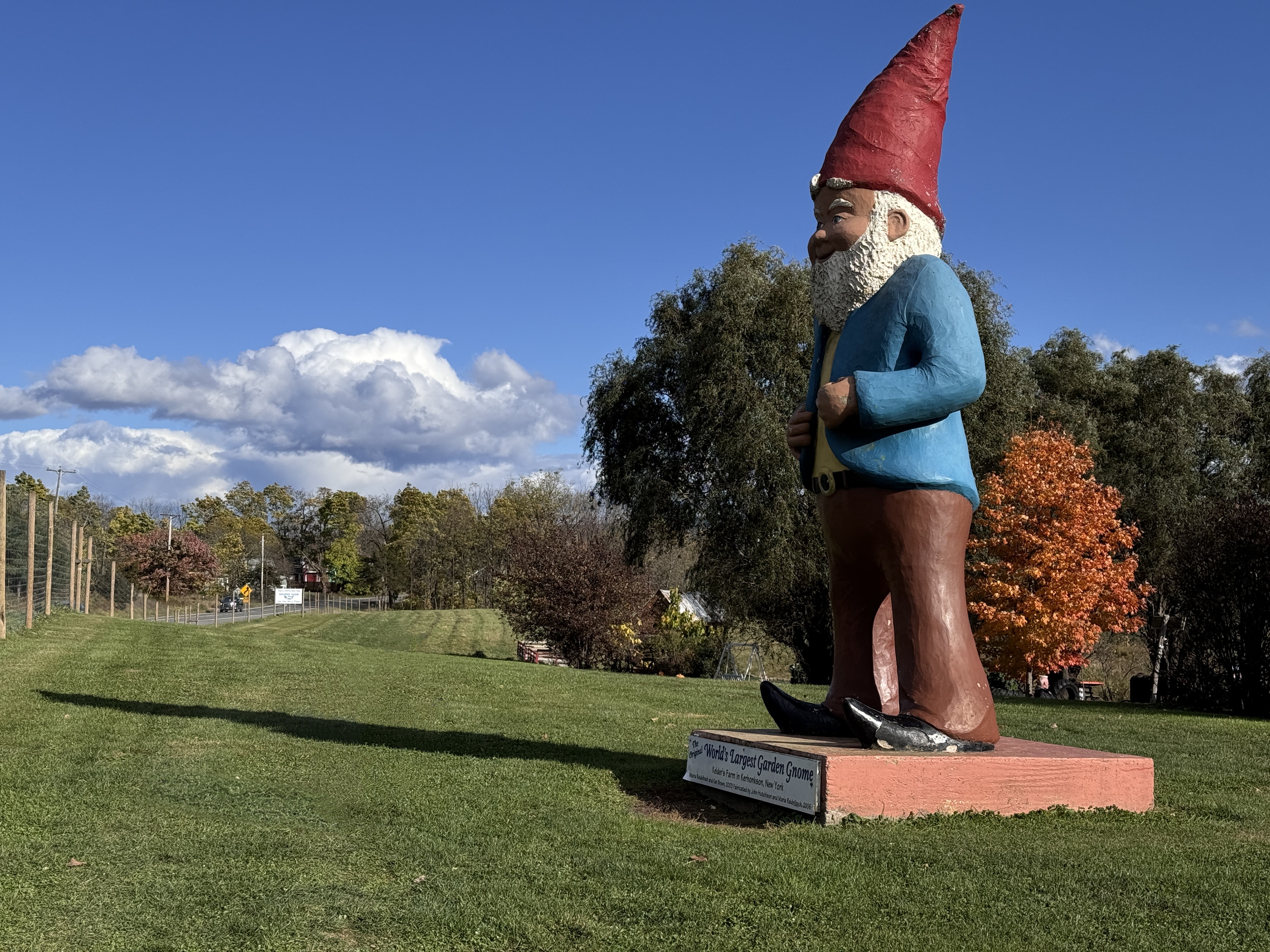 Tom's Guide videographer Marcus Cooper taking video of garden gnome statue.