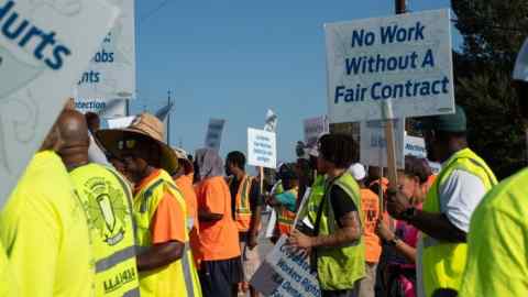 Dockworkers on strike outside the Port of Savannah in Georgia on Thursday