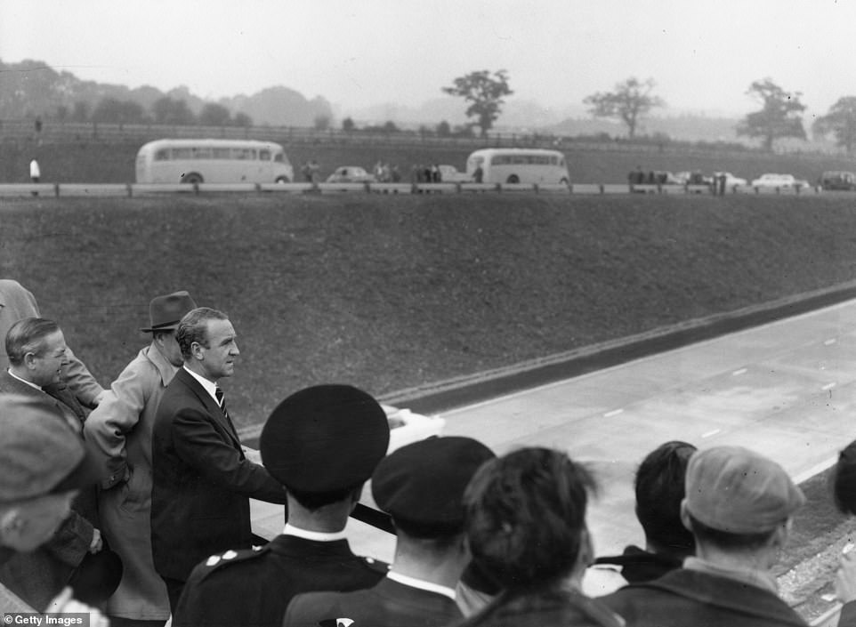 2nd November 1959: Transport Minister Ernest Marples on a road bridge near the London end of the newly opened M1 motorway