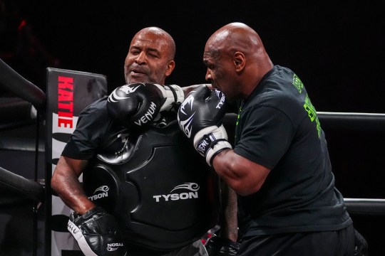 Mike Tyson, right, works out ahead of his boxing match against Jake Paul, Tuesday, Nov. 12, 2024, in Irving, Texas.