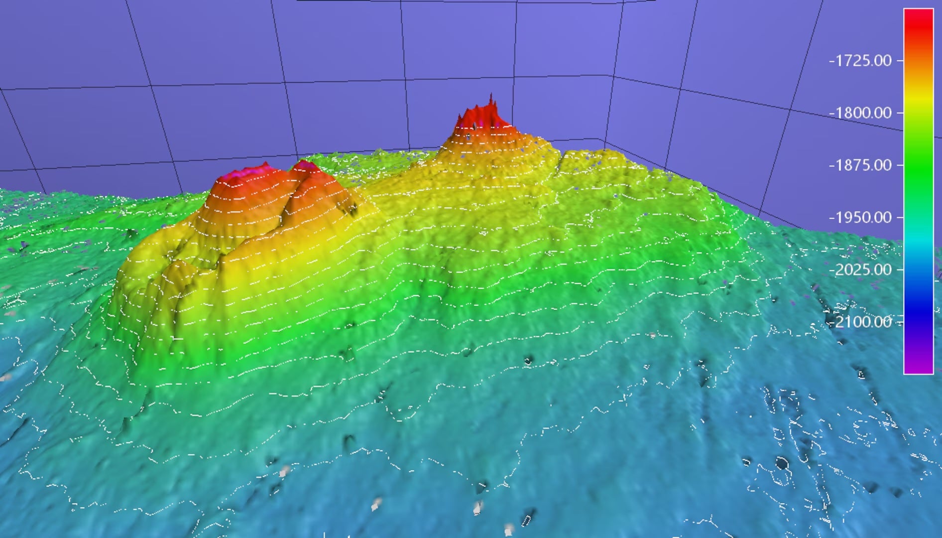 An image depicts the underwater volcano-like feature beneath the ocean near Alaska. However, it's far too deep to pose much of a risk to those on land