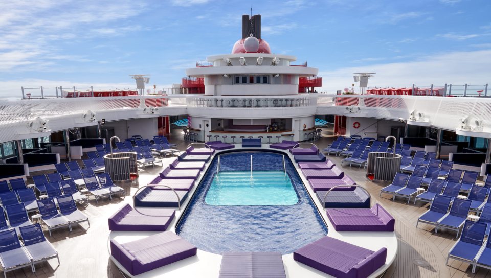 The on-board pool and decking area of Virgin Voyage’s Resilient Lady