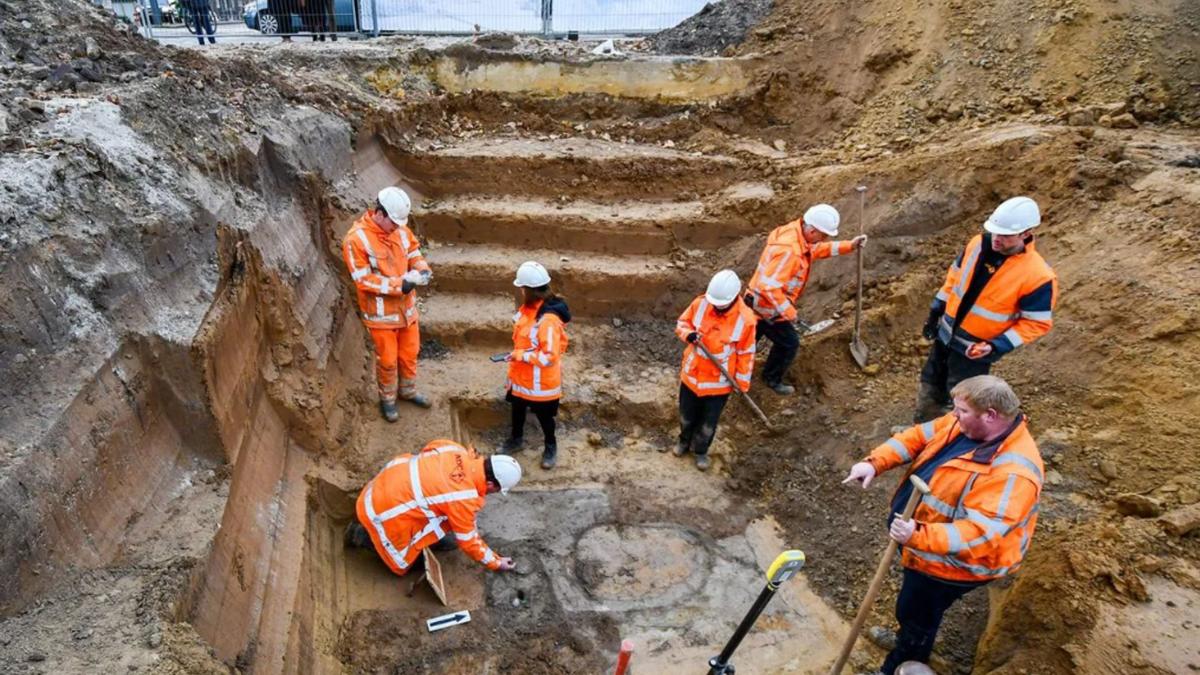 Archaeologists excavating Roman soldier’s grave