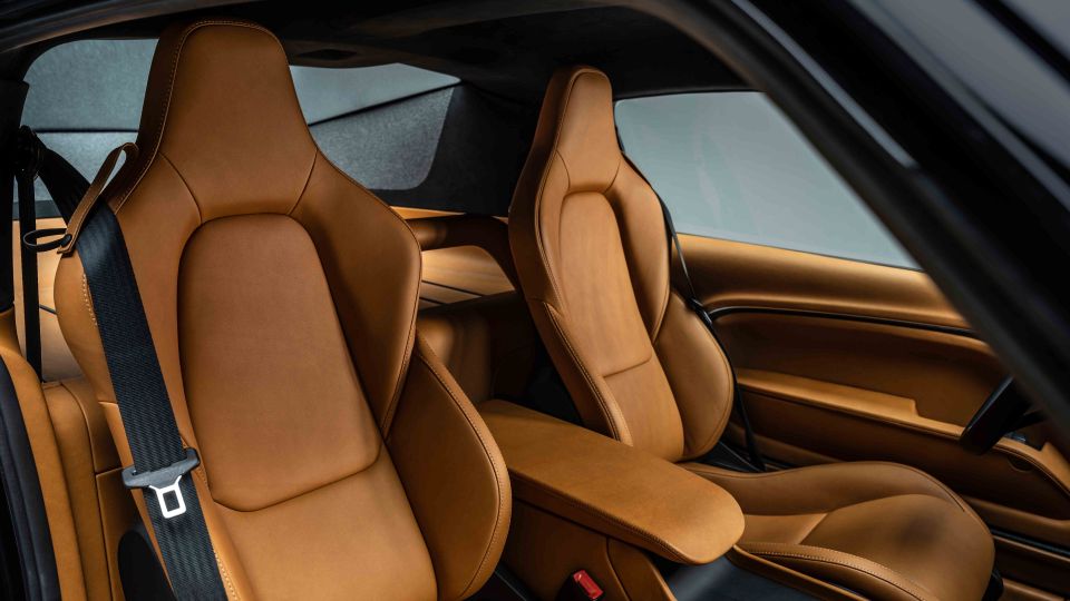 Tan leather interior of a sports car.