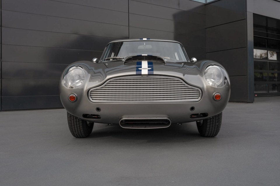 Rear view of a silver Aston Martin DB4 GT Continuation.