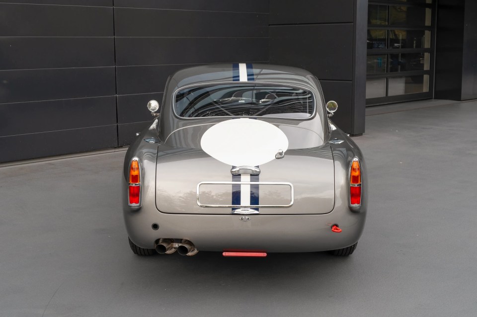 Rear view of a silver Aston Martin DB4 GT Continuation.