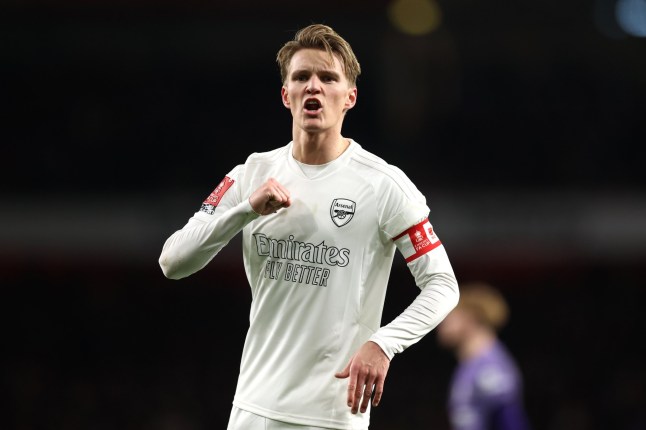 LONDON, ENGLAND - JANUARY 07: Martin Odegaard of Arsenal reacts during the Emirates FA Cup Third Round match between Arsenal and Liverpool at Emirates Stadium on January 07, 2024 in London, England. Arsenal wear an all-white kit at home, for the first time in the club's history, in support of the 'No More Red' campaign against knife crime and youth violence. (Photo by Julian Finney/Getty Images)