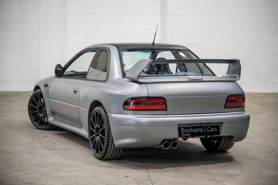 Rear view of a silver Subaru Prodrive P25.