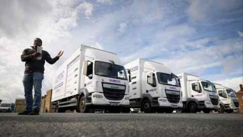 A driver after passing his HGV driving test at the National Driving Centre in Croydon in 2021