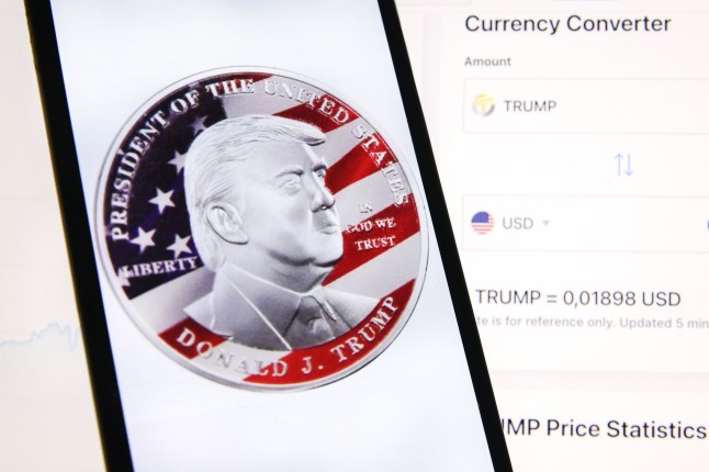 Mandatory Credit: Photo by Beata Zawrzel/NurPhoto/Shutterstock (15108551h) A representation of TrumpCoin cryptocurrency is displayed on a mobile phone for illustration photo. Krakow, Poland on Januar 20th, 2025 TrumpCoin Photo Illustrations, Krak?w, Poland - 20 Jan 2025