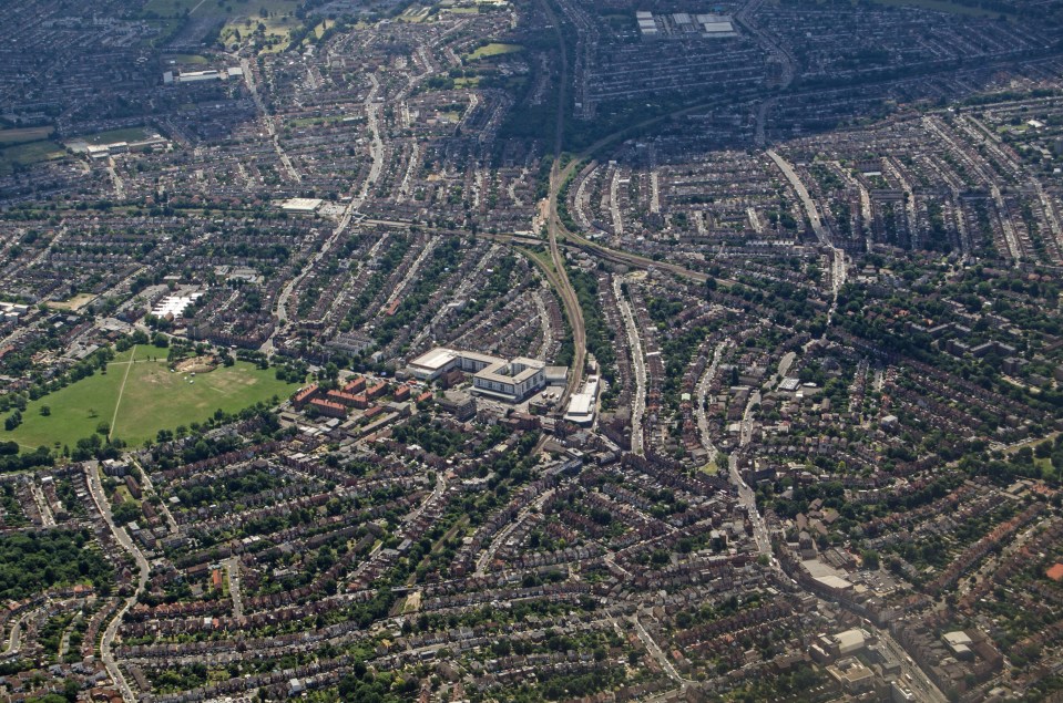 Aerial view of Streatham, South London, showing housing, parks, and railway lines.