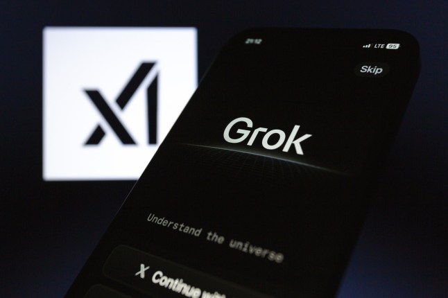 Mandatory Credit: Photo by Andre M Chang/ZUMA Press Wire/Shutterstock (15158328b) xAI's standalone Grok AI chatbot iOS app is displayed on iPhone backdropped by xAI logo. xAI Grok AI Chatbot, Asuncion, Paraguay - 18 Feb 2025