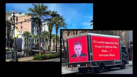 A view of New Orleans near the Roosevelt Hotel and a truck parked in front of the entrance to the conference hotel in New Orleans that had a mounted electronic billboard featuring Elon Musk