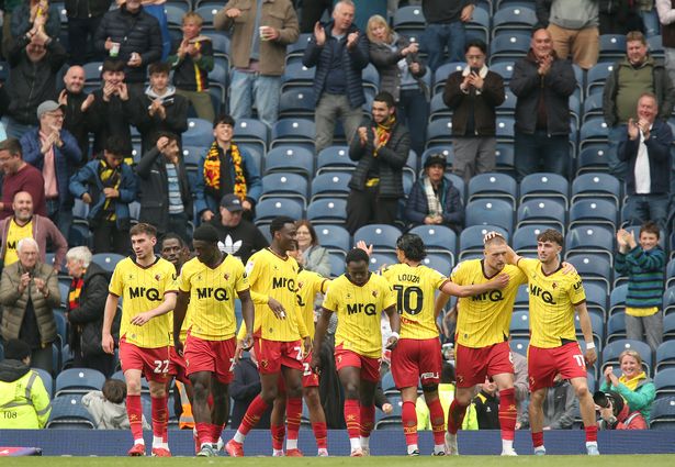 Watford's Mattie Pollock (2nd right) is joined by team-mates as he celebrates scoring