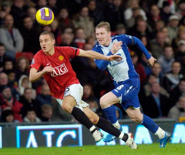 Pictured in the Barclays Premiership match between Manchester United and Birmingham City at Old Trafford is Garry O'Connor and Nemanja Vidic