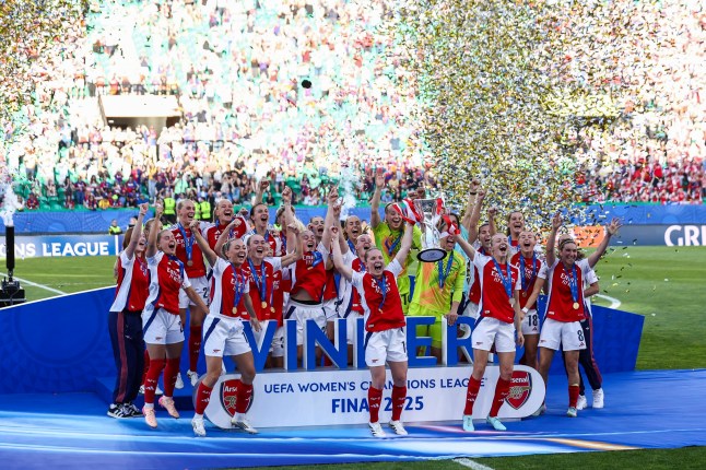 LISBON, PORTUGAL - MAY 24: Arsenal WFC players with the UEFA Women's Champions League trophy after the UEFA Women's Champions League final match between Arsenal WFC v FC Barcelona at Estadio Jose Alvalade on May 24, 2025 in Lisbon, Portugal. (Photo by Carlos Rodrigues/Getty Images)
