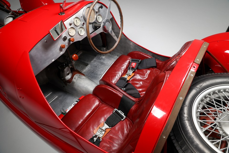 Interior view of a red 1948 Ferrari 166 Spyder Corsa.