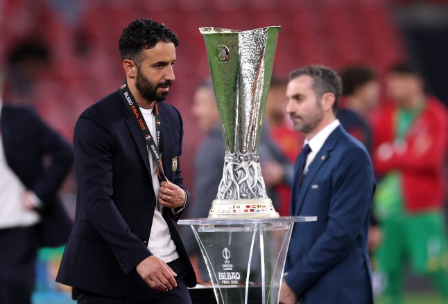 BILBAO, SPAIN - MAY 21: Ruben Amorim, Manager of Manchester United, walks past the UEFA Europa League Trophy after his sides defeat in the UEFA Europa League Final 2025 between Tottenham Hotspur and Manchester United at Estadio de San Mames on May 21, 2025 in Bilbao, Spain. (Photo by Michael Steele/Getty Images)