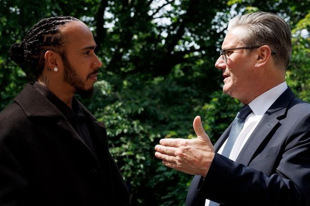 Lewis Hamilton speaking with Prime Minister Keir Starmer